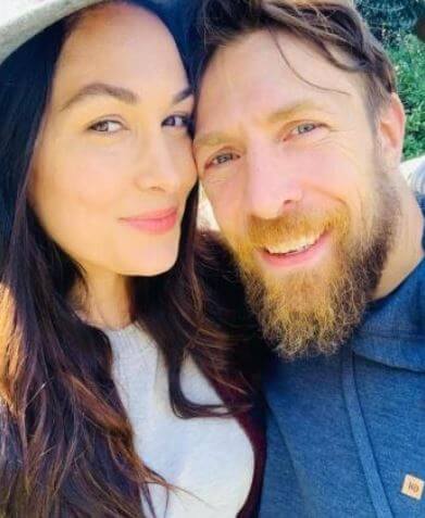 Birdie Joe Danielson parents Brie Bella and Daniel Bryan giving the relationship goals.